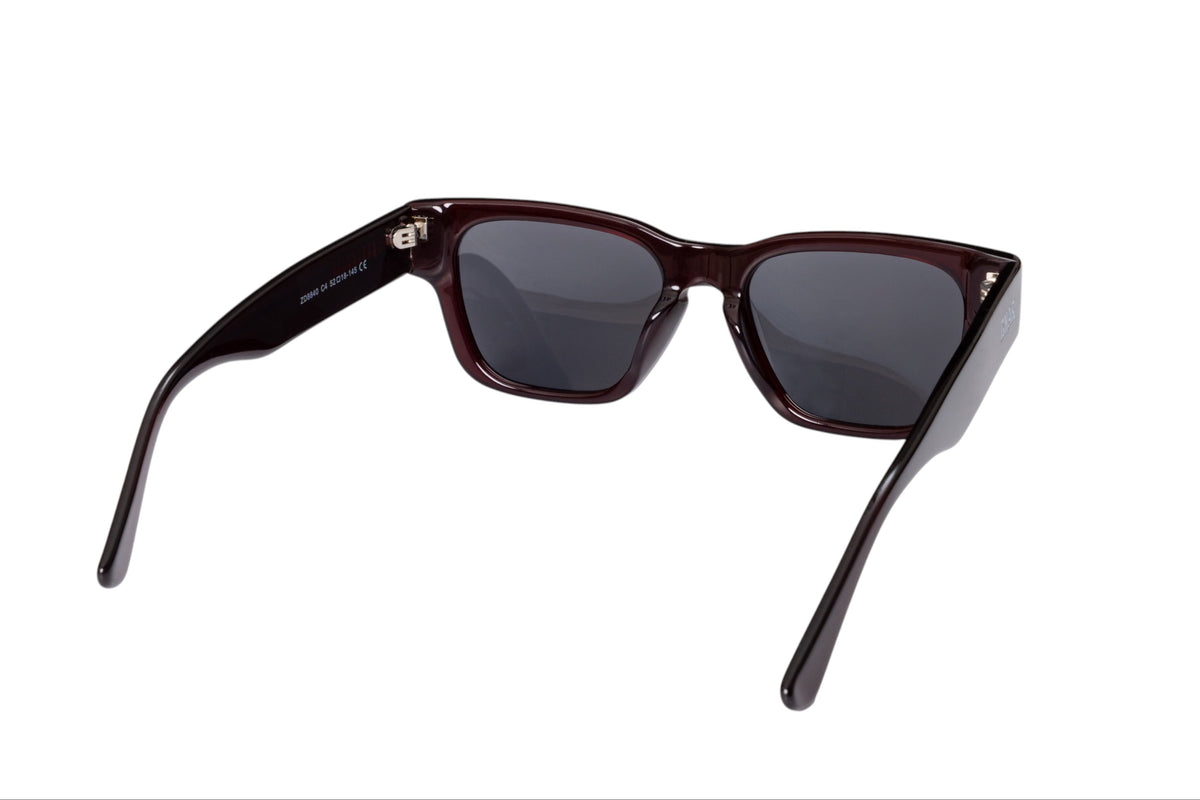 Rear view of Gnar Optics Disaster sunglasses with dark acetate burgundy frames and dark grey polarized lenses