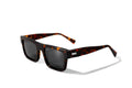 Front view of Gnar Optics Sender sunglasses with rectangular tortoise acetate frames, dark grey polarized lenses and a white GNAR logo on the arm