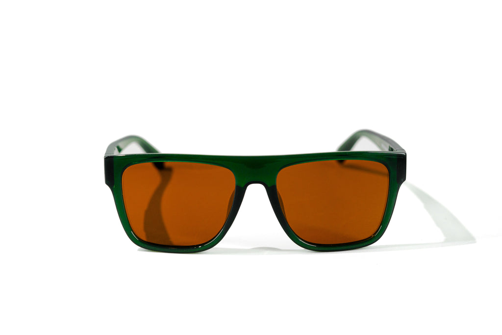 Sunglasses with green frame and brown lenses on a white background