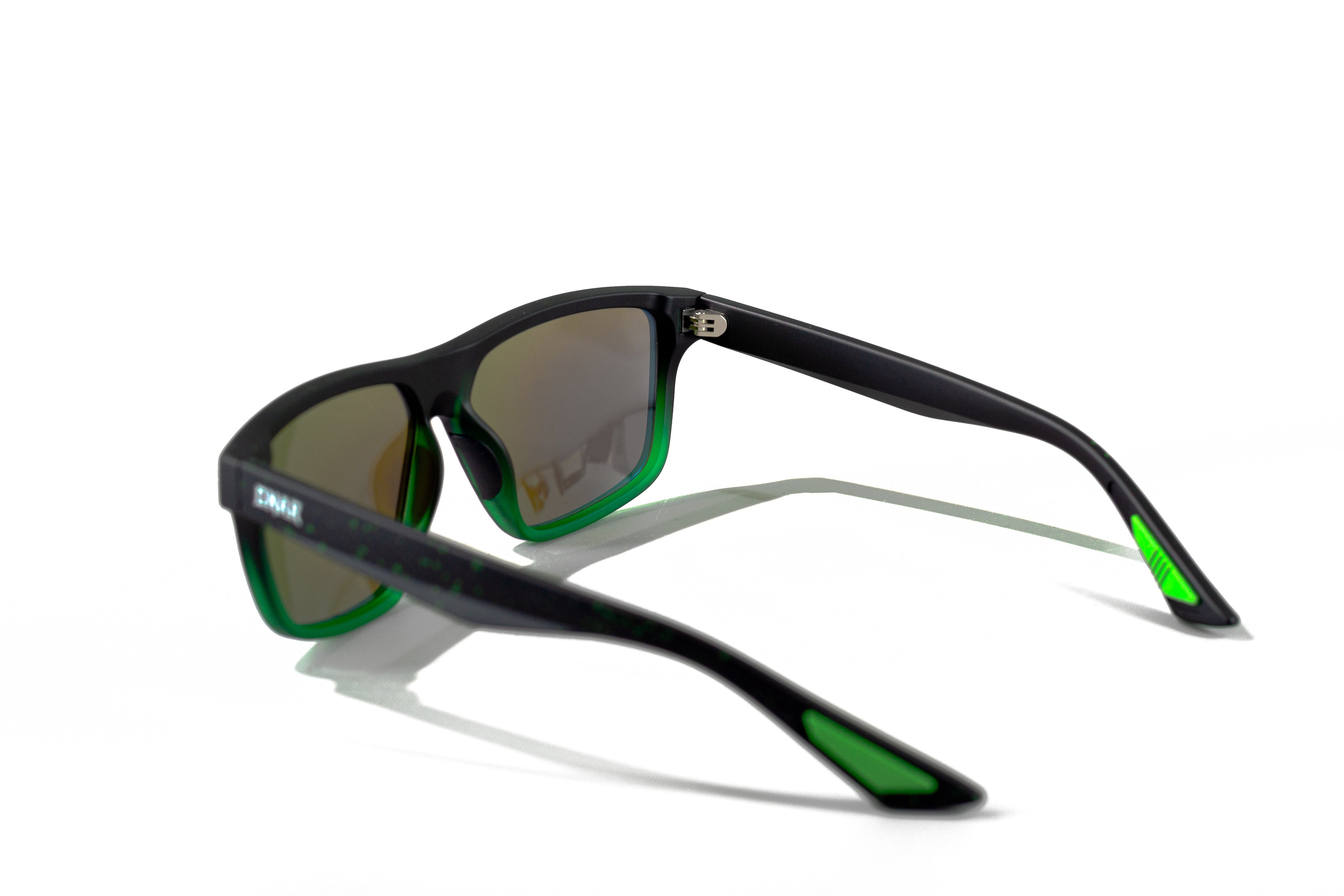 Black and green sunglasses on a white background