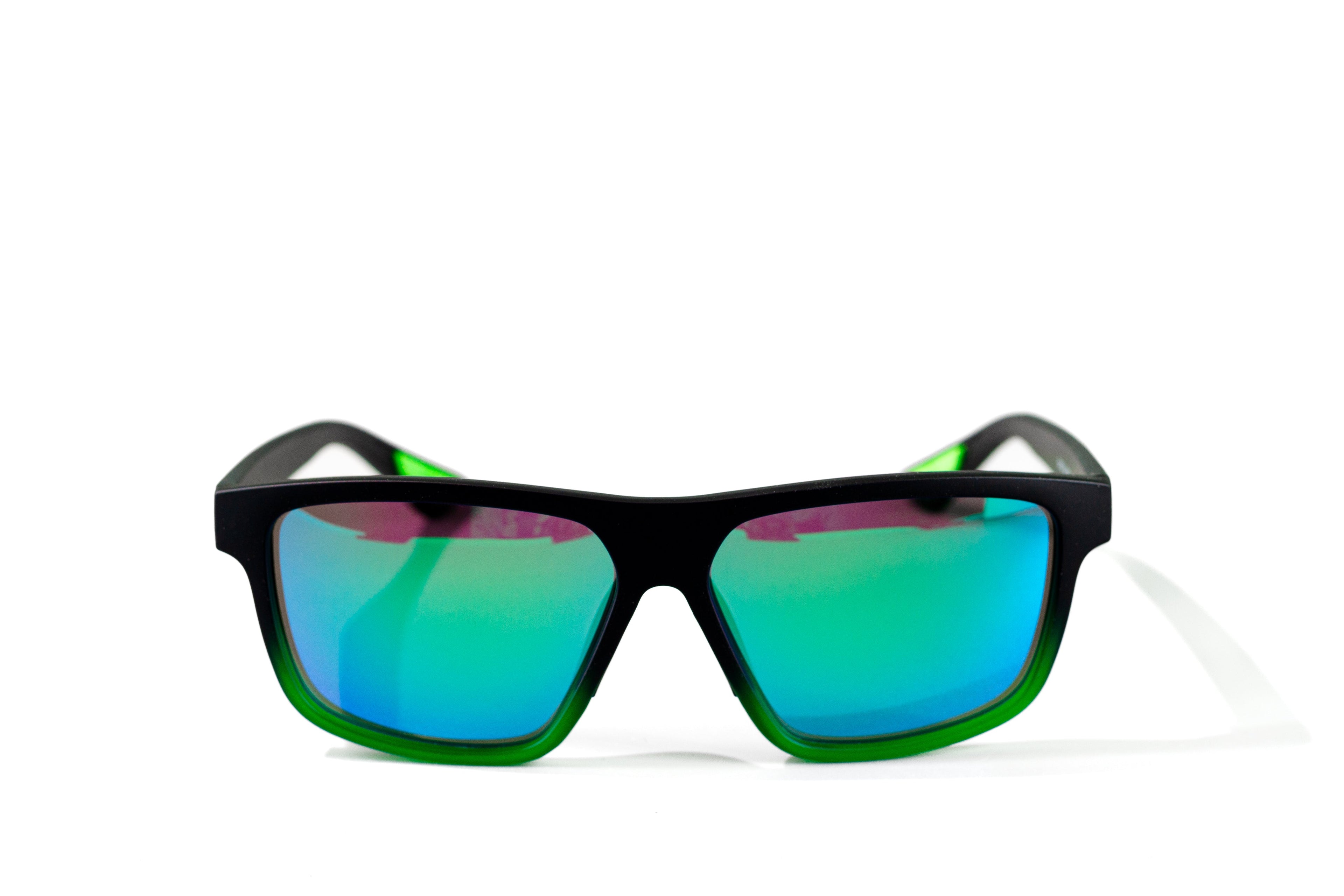 Sunglasses with black frame and green reflective lenses on a white background