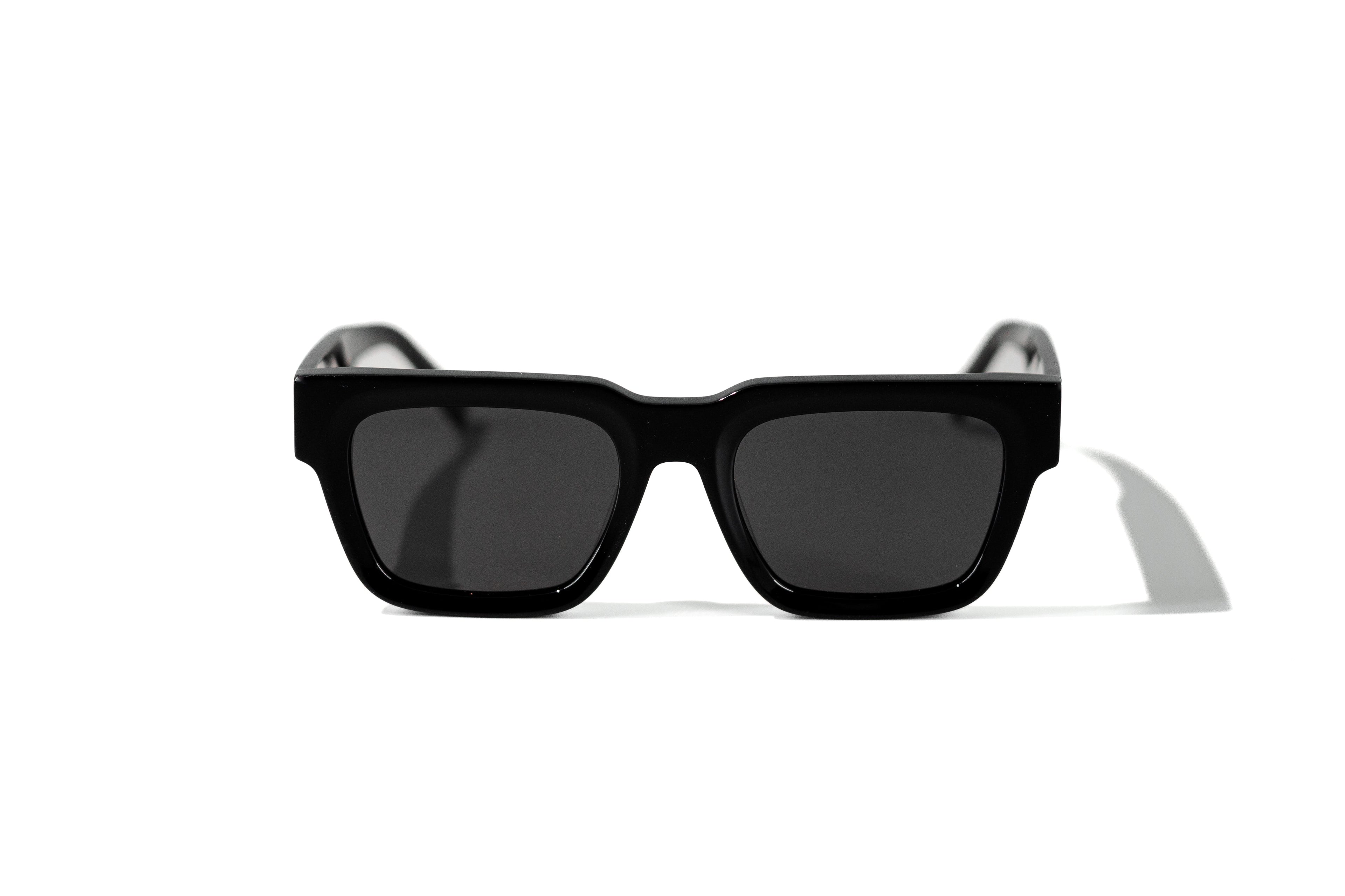 Black sunglasses on a white background